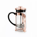 Prensa francesa oro rosa de 350 ml con filtro metálico reutilizable para preparar café de especialidad.
